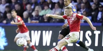 Oldham defeats Woking to snap a six-game losing streak in the Vanarama National League.