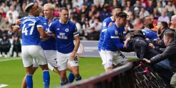 Callum Robinson’s late equaliser earns Cardiff a point in derby at Swansea