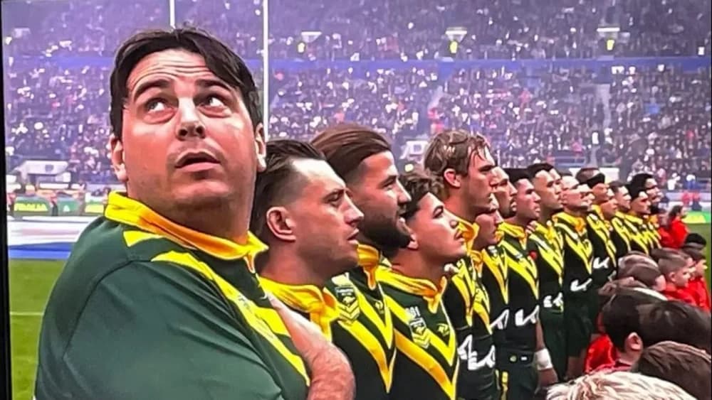 Infamous pitch invader lines up with Australia before being escorted from pitch